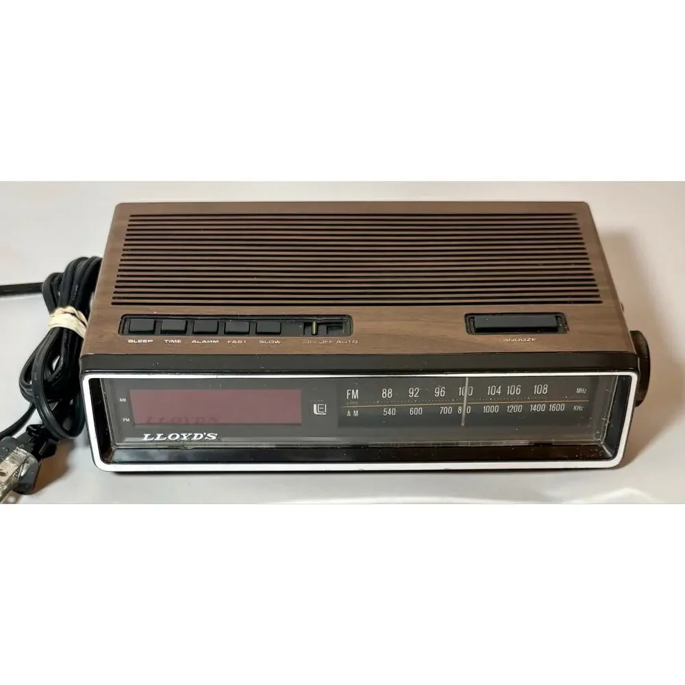 Vintage Lloyds Model J274A Clock Radio Simulated Wood Grain Plastic- clock only